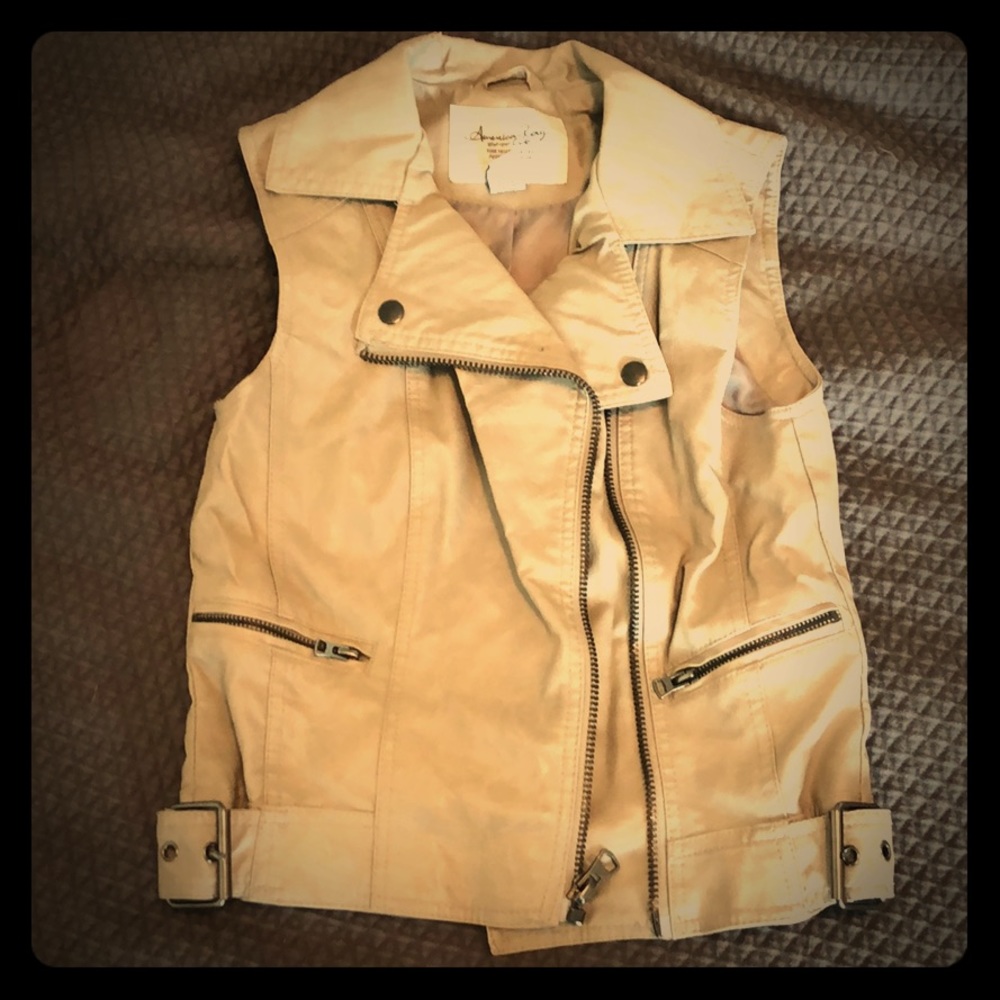 Sleeveless tan vest